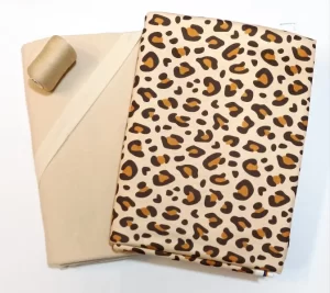 پارچه تریکو طرح پلنگی به همراه پارچه کرمی و قرقره ترویرا هم رنگ برای ست