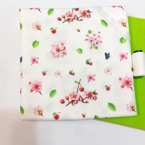 پارچه تریکو طرح شکوفه گیلاس از نمای نزدیک