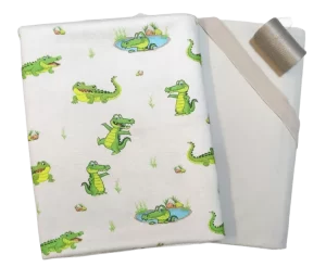 پارچه تریکو طرح تمساح به همراه ست یکرو پنبه سوپر طوسی و قرقره همرنگ